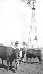 Grandfather Fred Baumberger with Infant Fred Eastof Cattle Barn