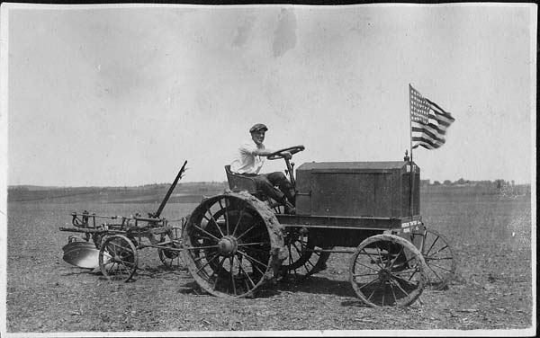 Gas-powered Tractor and Plow