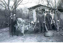Men Posing During Hog Slaughter